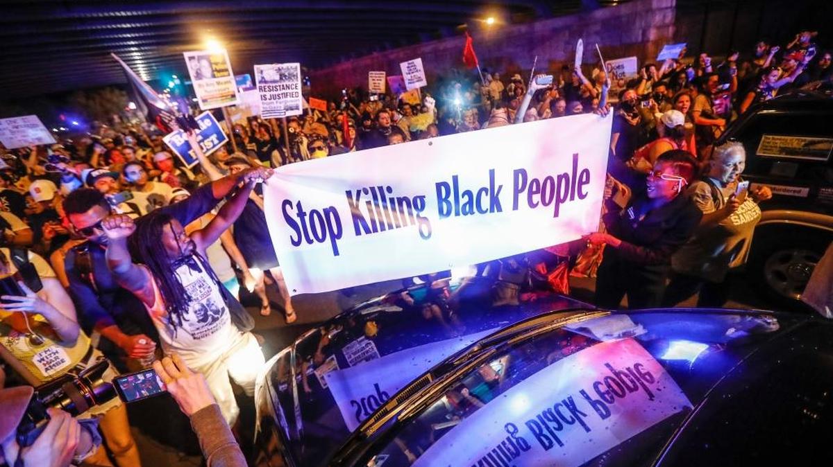 Black Lives Matter demonstrators march on Broad Street in Philadelphia on Tuesday during the second day of the Democratic National Convention.