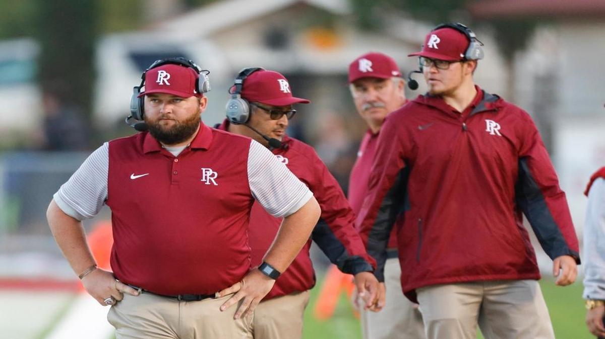 J.R. Reynolds, left, is the fourth head football coach at Paso Robles High School in less than two years.