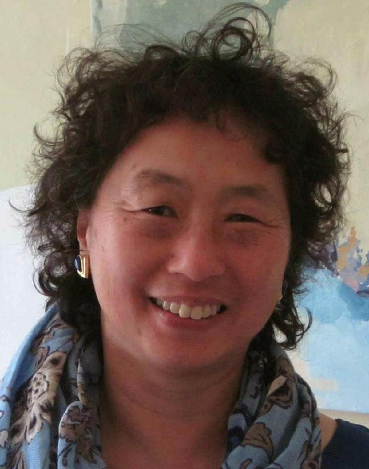 Janice Fong Wolf.