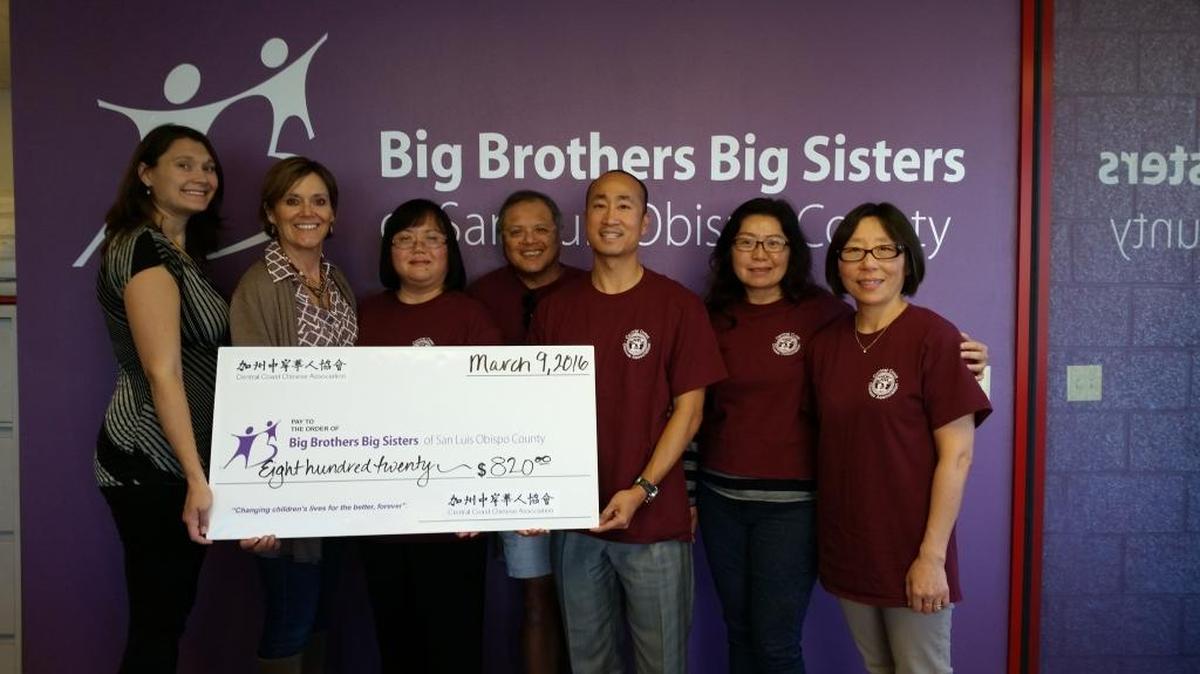 The Central Coast Chinese Association has donated $820 to Big Brothers Big Sisters in support of the agency’s mentoring programs for children. The funds were raised by the association’s 2016 Chinese New Year celebration. From left, Anna Boyd-Bucy and Patty Carpenter of Big Brothers Big Sisters are presented with a check by Wenhui Zhou, Elliott Gong, Mike Chen, Katherine Hudson and Mai Wilson of the Central Coast Chinese Association.