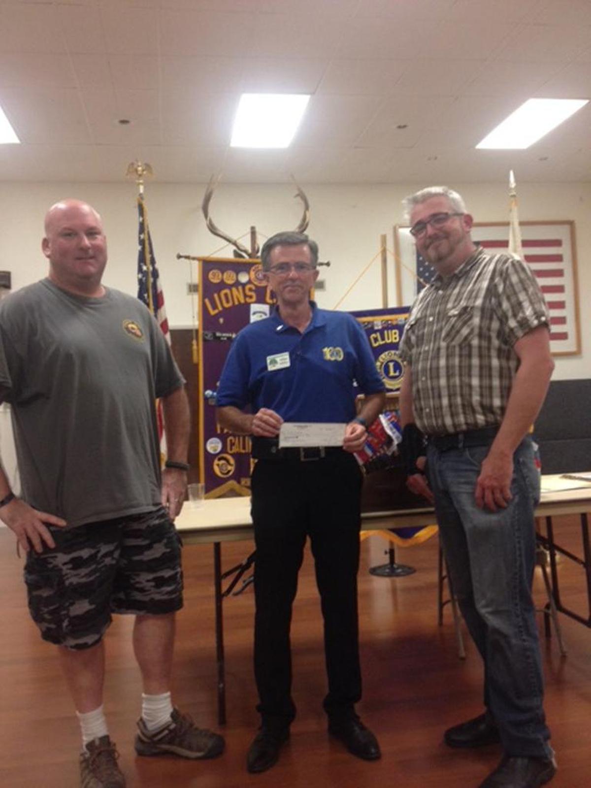 Jason Holland, director of the Veterans Falconry Initiative, recently spoke to the Paso Robles Lions Club about his organization. He established the Veterans Falconry Initiative to help U.S. military veterans deal with traumatic experiences by learning to train falcons to hunt. Above, from left, are Mike Silvera, a novice falconer, Mike Milby, president of the Paso Robles Lions Club, and Holland. The Paso Robles Lions Club donated $300 to the Veterans Falconry Initiative.