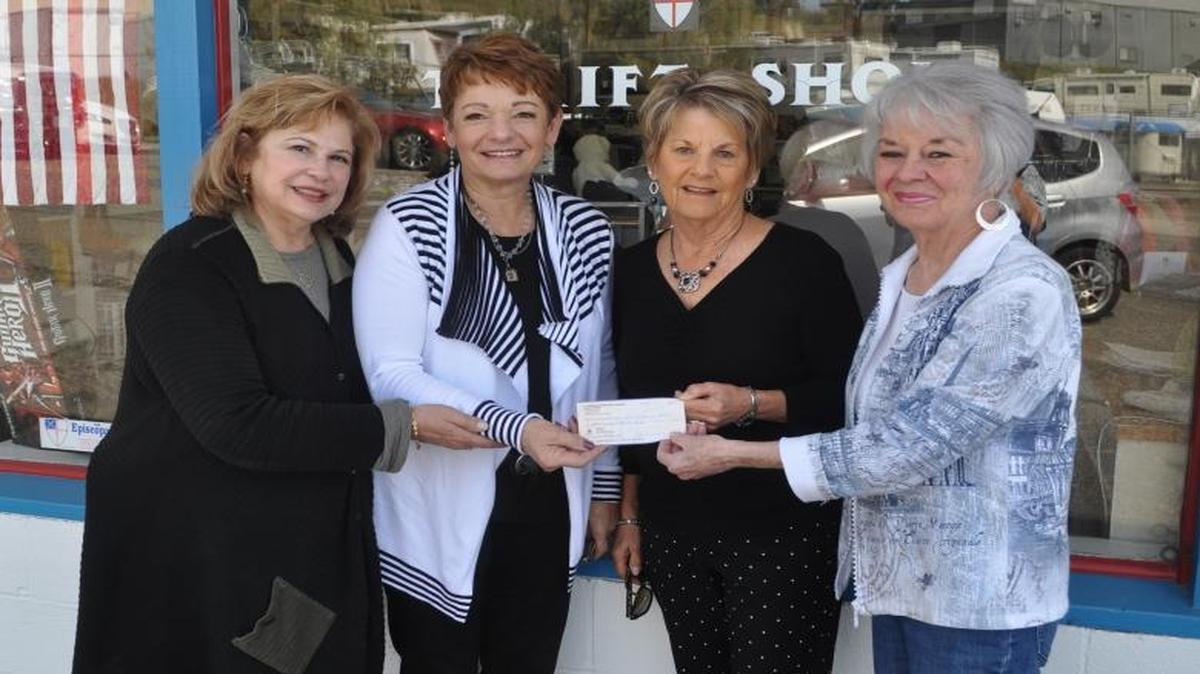 St. Barnabas Thrift Shop volunteers Susan Murray, left, and Stormi Martel, right, present a donation of $899 to Joanne Rogoff and Cheryl Fernandez for Central Coast Funds for Children, an organization dedicated to helping children in need. The Arroyo Grande thrift shop gives a percentage of its earnings to a charitable organization each month.