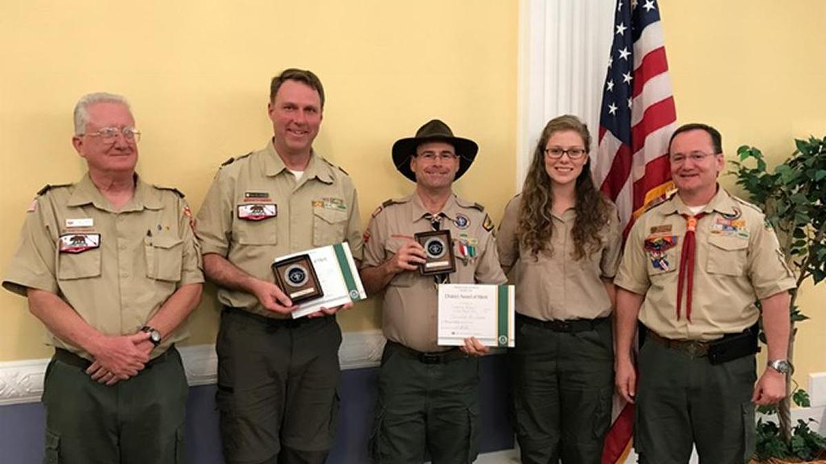From left, Harry Holden, chairman of the San Luis Obispo Camino Real District of the Boy Scouts of America, presented the district award of merit to Scoutmasters Nate Maas and Jarrett Prichard, with Erica Mundell-McGilvray, district executive and Brian Hascall, district commissioner.