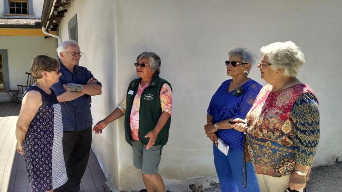 Docents Toni Kincaid, Donn Clarius, Chris Oswald, Carol Whitaker and Marilyn Darnell from the Jack House in San Luis Obispo learn about the Dana Adobe in Nipomo on a special tour by Dana Adobe docent Marina Washburn, center.