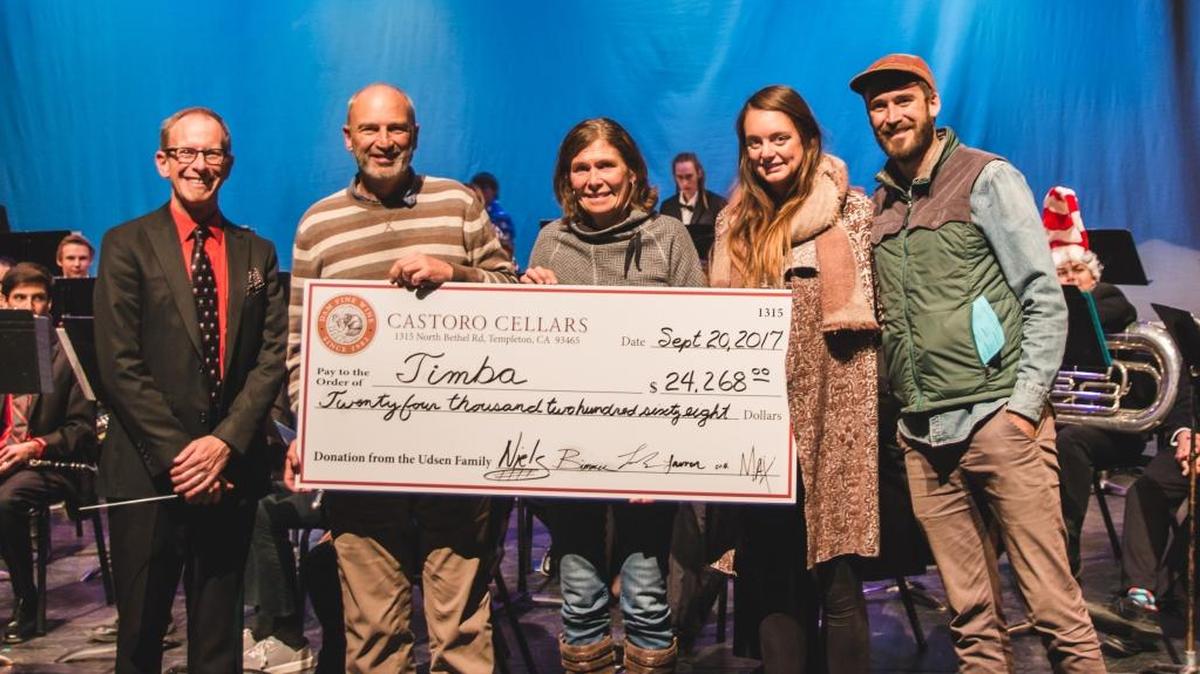 The Udsen family from Castoro Cellars recently presented a check to David Landers, left, for the Templeton Instrumental Music Boosters Association. The money was raised at last year’s Whale Rock Music and Arts Festival.