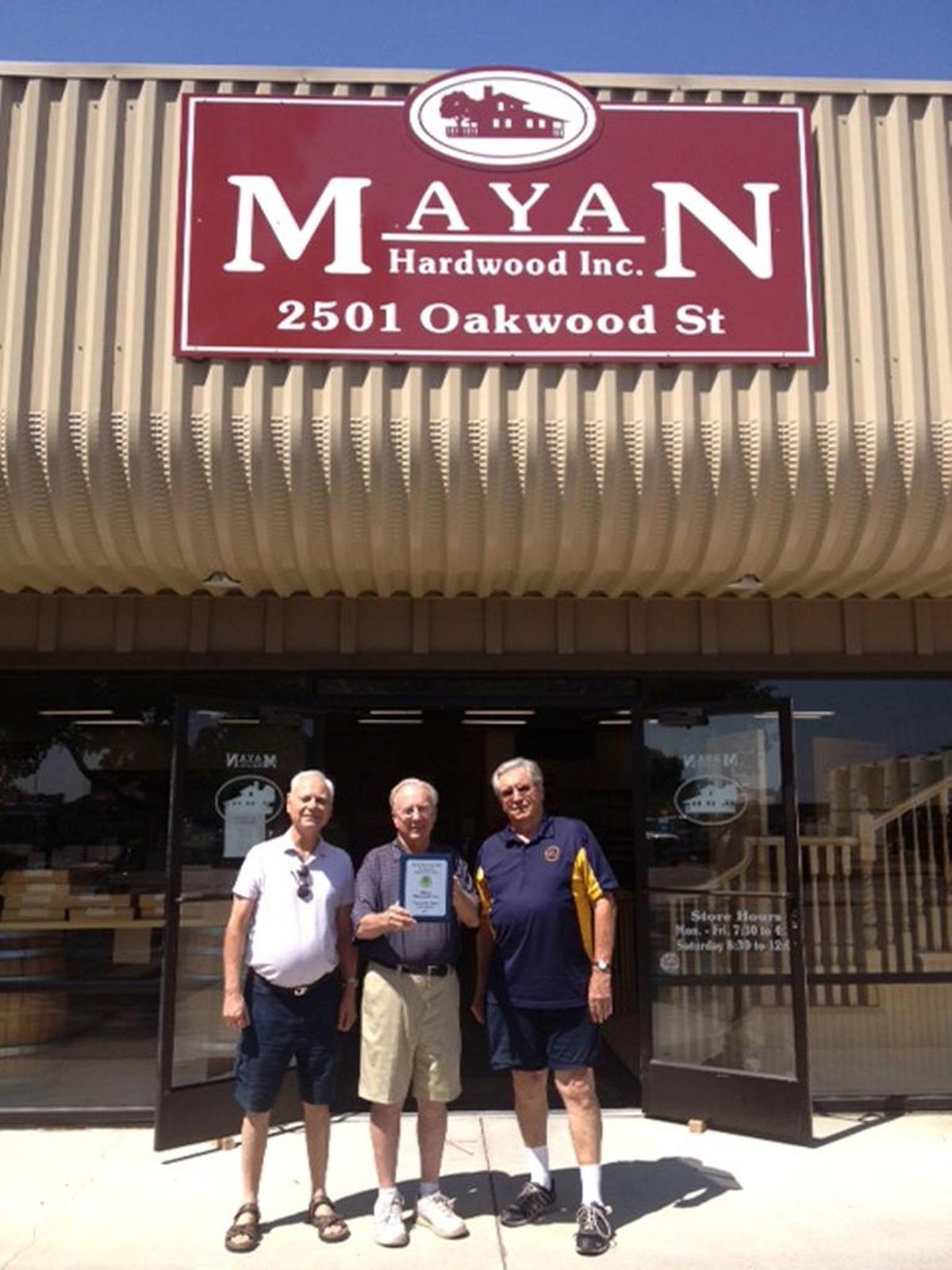 Darryl Paul of Mayan Hardwood, center, received a thank-you award from the Paso Robles Lions Club, presented by Lions Vice President Joel Zwick, left, and Rolf Gehrung, chairman of donations committee.