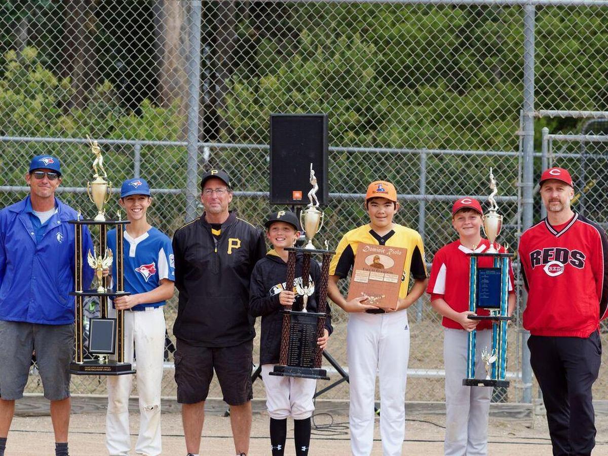 Coaches and Coast Little League award winners, left to right: Ryan White, Morgan Codron, Nick Johnson, Arnie Silacci, Jonathan Sze, Aiden Casper, Matt Saunders.