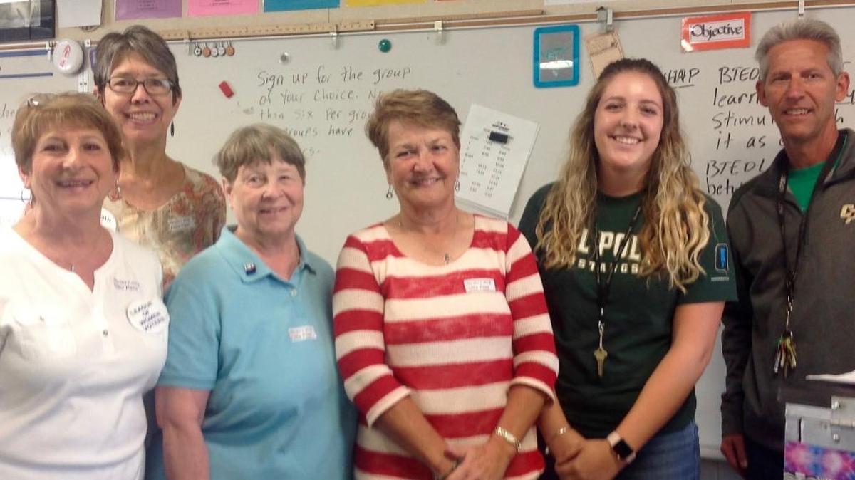 Julie Rodewald with League of Women Voters team members Ruth Nimeh, Juliane McAdam and Sharon Whitney register students to vote with student teacher Kaylin Embrey and government/civics teacher Mark Hochin at Nipomo High School.