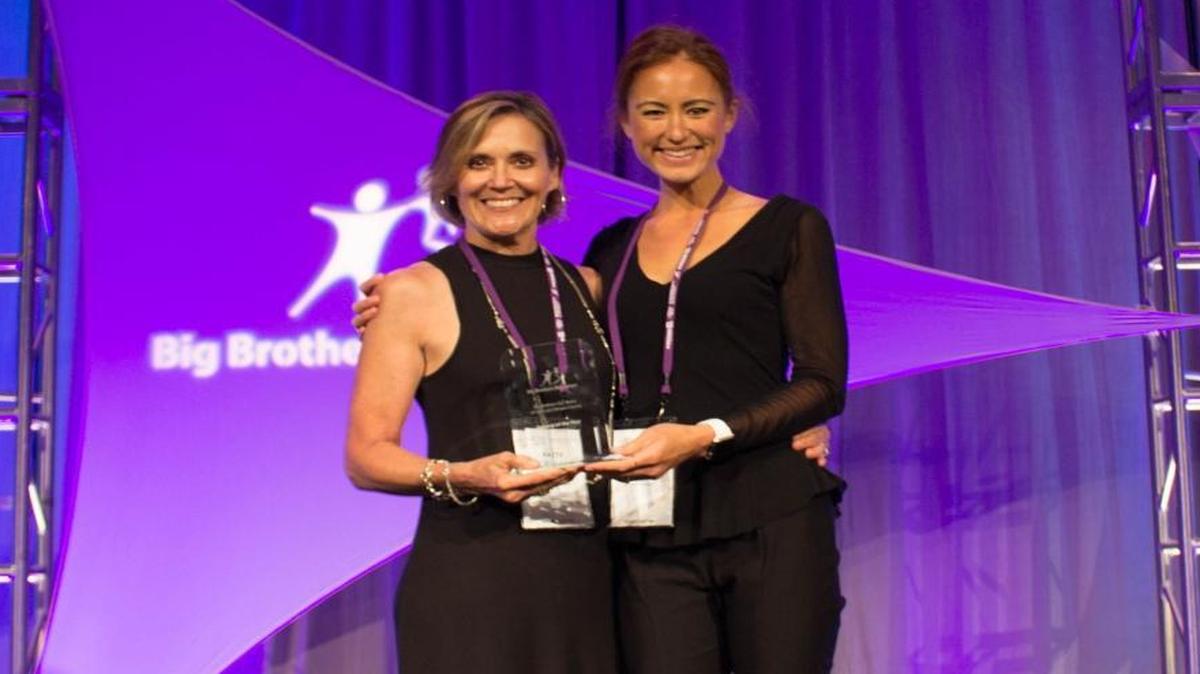 From left, Big Brothers Big Sisters of San Luis Obispo County’s development director, Patty Carpenter, and the board’s president, Christie Clemons, accepts the Agency of the Year award in the small to mid-sized agency alliance category.