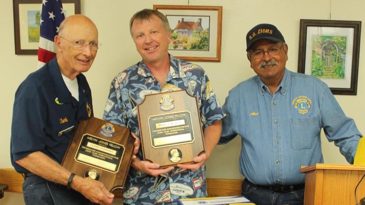 Arroyo Grande Lions Clark Channing, left, and Patrick McNeill, center, each were presented with Lions Club International Melvin Jones Fellowship awards by Arroyo Grande Lions Club President Art Delgadillo, right, at the club’s recent annual installation dinner.