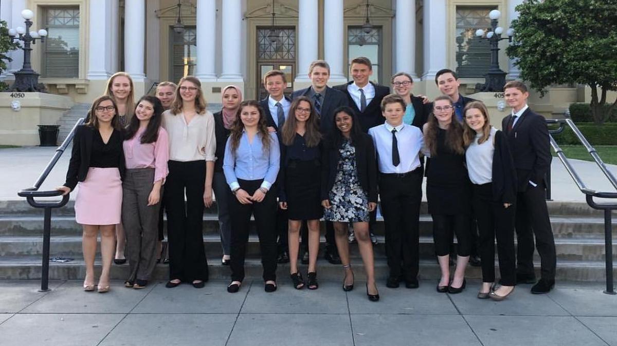 For the fourth year in a row, the Arroyo Grande High School Mock Trial team won the San Luis Obispo County Mock Trial competition, advancing to the state competition in Riverside. The team is pictured in front of the historic Riverside Courthouse, where the final round was held.