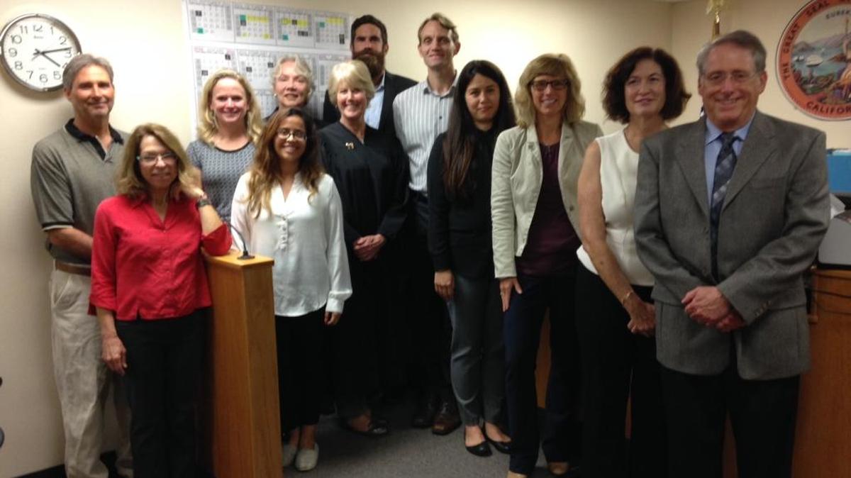Juvenile Court Judge Linda Hurst recently swore in 12 new volunteers for Court Appointed Special Advocates for Children. Back row, from left are Casey Adams, Stacy McLain, Kathleen Oehler, Jared Snelson and Jason McMillan; front row, Annie Graves, Rosie Guzman, Judge Linda Hurst, Shawna Cooper, Ginni Callow-Adams, Cathy Swenson and John Rosenthal. Not pictured is Karen O' Connell. For information about volunteering, call 541-6542.