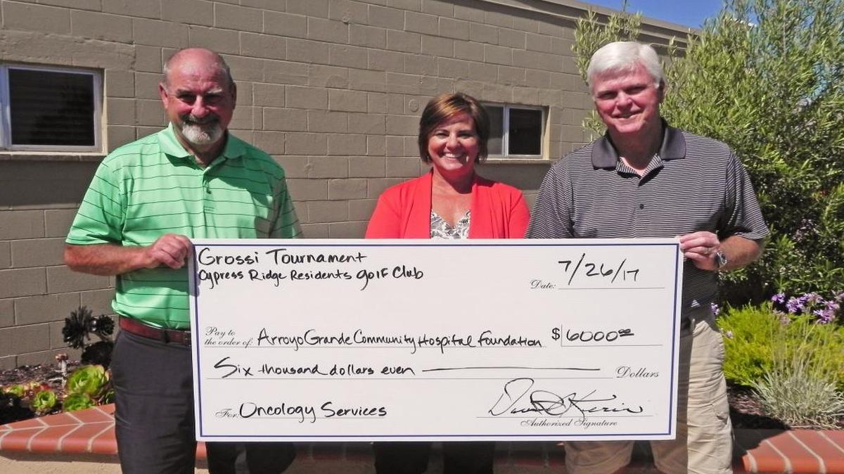 From left, Tim Demma, Grossi Golf Tournament co-chair, Montisa Phelan Lopez, vice president of philanthropy with the Arroyo Grande Community Hospital Foundation, and Dave Kerin, Grossi Golf Tournament co-chair, present the check.