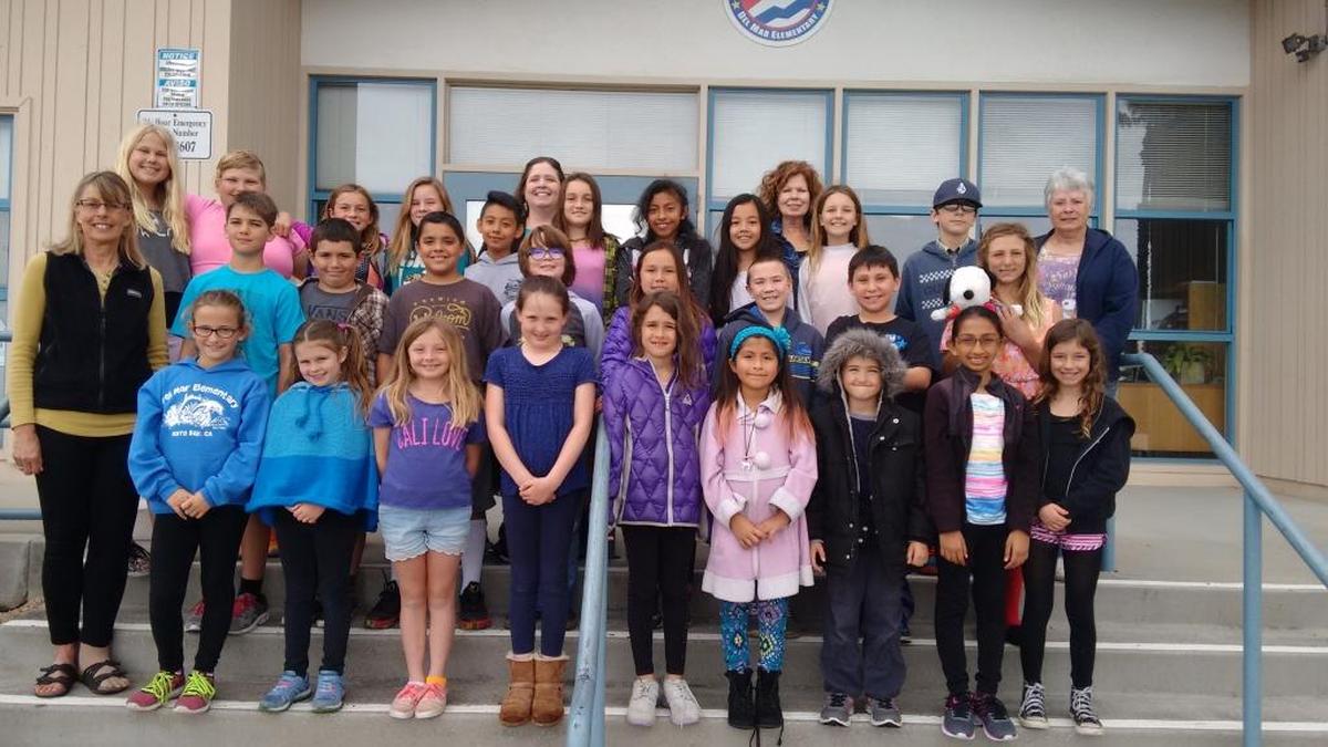 Pictured are Del Mar Elementary School student council officers and representatives, Morro Bay Food Group volunteers Jean Radin, Linda Fidell and Jane Butler, and Del Mar Principal Janet Gould.