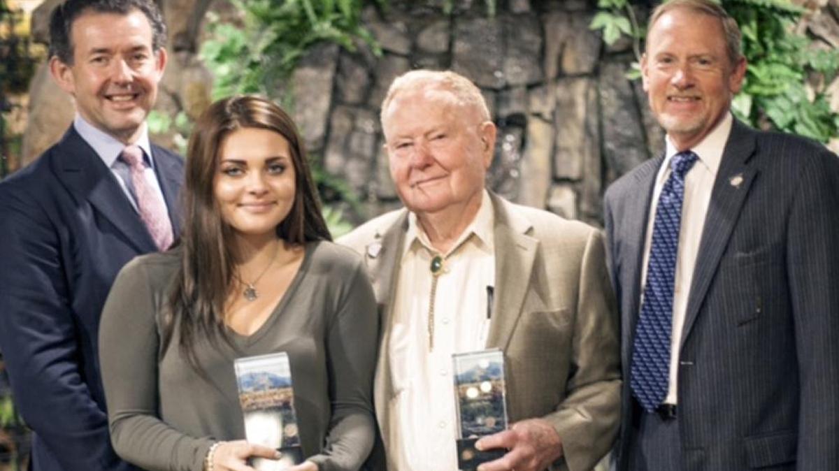 Leah Maier and Clifford Clark, center, hold their philanthropy awards from the Association of Fundraising Professionals San Luis Obispo County chapter. They are pictured with Andre Watt, left, president and CEO of AFP, and Matthew Cottle, right, AFP SLO County chapter president.