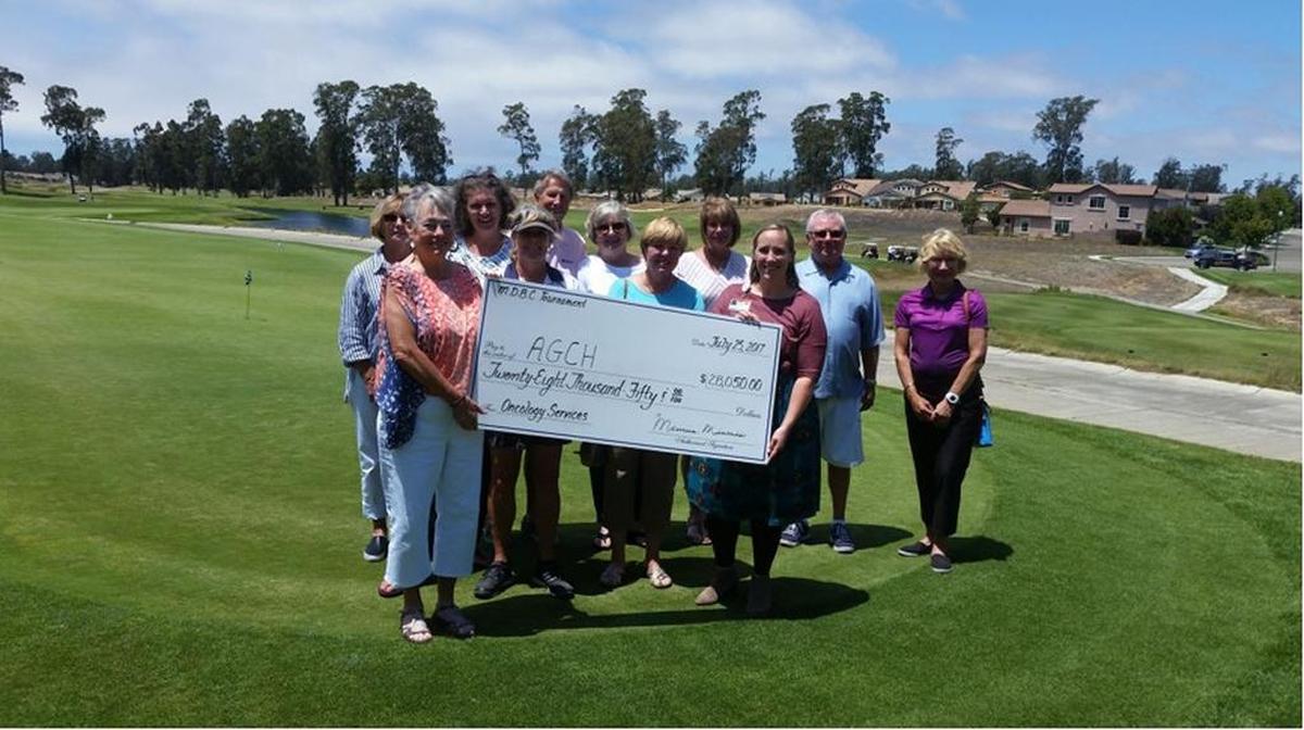 Maurine Minnis, chair of the Monarch Dunes Memorial Golf Tournament, presents a check to Shelby McLean of Arroyo Grande Community Hospital. The fifth annual golf tournament held in July raised $28,050 for the hospital’s Oncology Fund and will be used for various oncology services within the community.