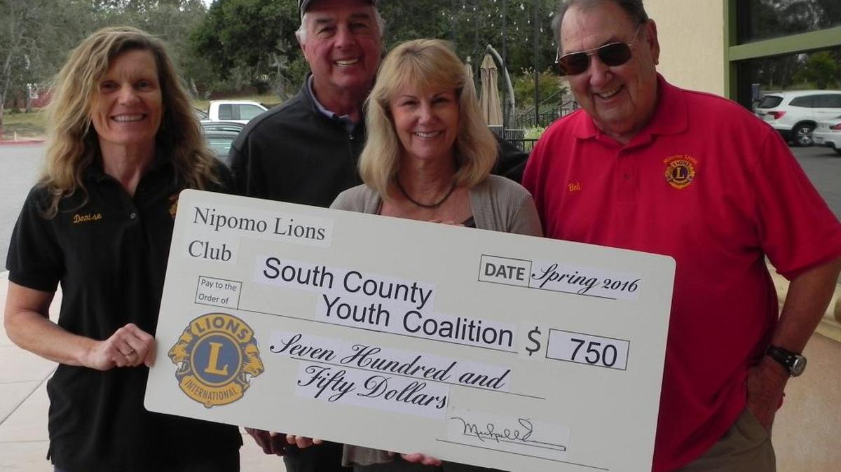 The Nipomo Lions Club recently donated $750 to the South County Youth Coalition. Youth Coalition representative Mary Squellati, second from right, was presented with a celebratory check from Nipomo Lions Club members Denise Farmer, left, Wally Crookes and Bob McGill.