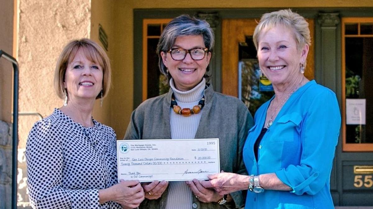 Representatives from The Mortgage House present a $20,000 initial endowment to The Community Foundation San Luis Obispo County, which will manage the endowment. The endowment has been established by The Mortgage House to celebrate 20 years serving clients. Pictured are, from left, Mary Trudeau, sales manager of The Mortgage House, Heidi McPherson, CEO of the foundation, and Roxanne Carr, division president of The Mortgage House.