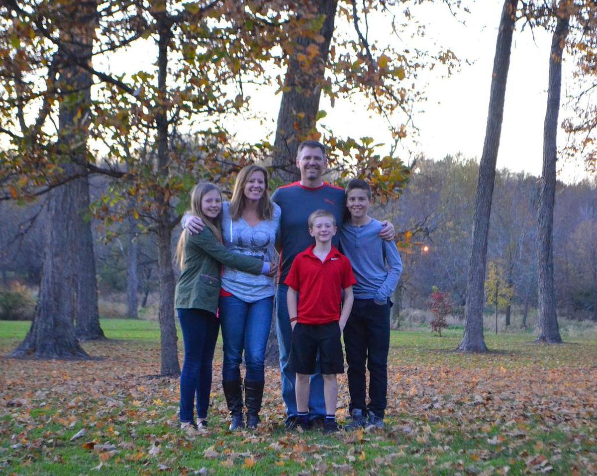 Tom Olmstead, shown with his family, will become head of Coastal Christian School in Pismo Beach.