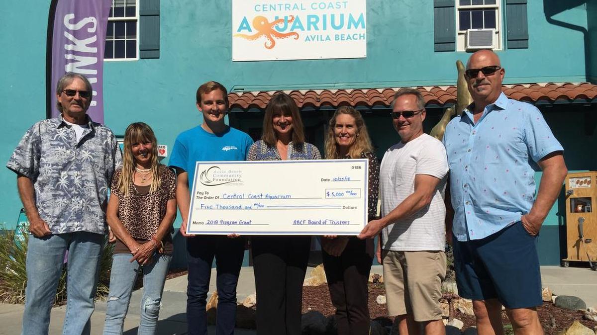 With the $5,000 grant presented to the Central Coast Aquarium are, from left, Avila Beach Community Foundation Executive Director Rick Cohen, Foundation Trustee Bev Aho, Central Coast Aquarium Director of Programs Travis Norton, Central Coast Aquarium Executive Director Christine Johnson, Foundation Trustees Cyndy Lakowske, Gary Maier and Richard Zacky.