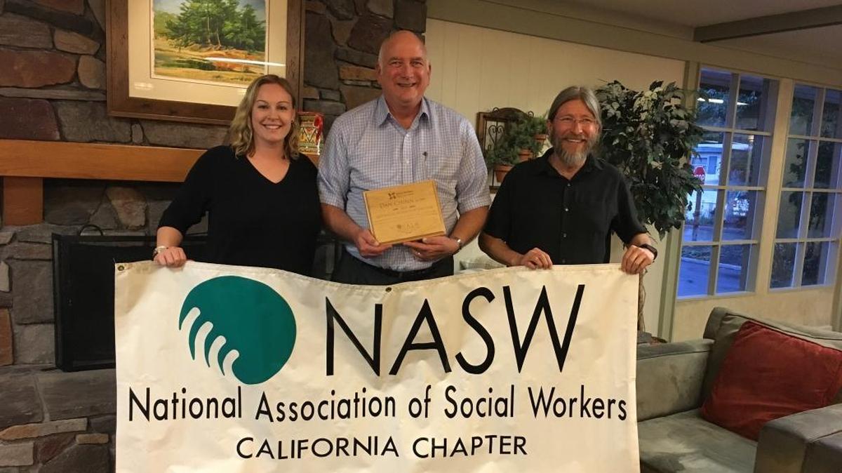 From left, KC Doughty, Dan Chinn, and Michael Teubner pose for a photo. Chinn, a licensed clinical social worker, was honored as 2018 Social Worker of the Year by the San Luis Obispo unit of the National Association of Social Workers, which Doughty and Teubner co-chair.