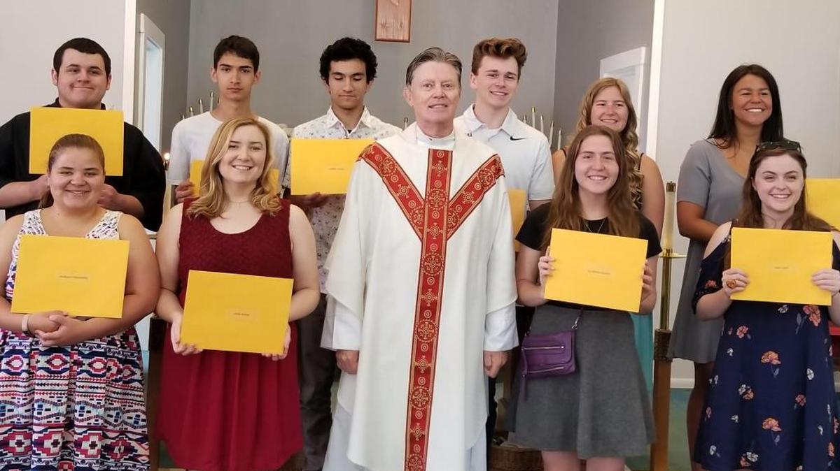 Santa Margarita de Cortona Catholic Church recently awarded $1,250 scholarships to 10 parish students. The recipients are shown here with Father Robert Travis: From left (back row) Ryan Martin, Robert Lastra, Jaz Zuniga, Thomas Heckman, Marina Smeltzer and Grace Oeser. Front row: Morgan Hernandez, Sadie Wessel, Father Travis, Katherine Schulte and Johannah Smet.