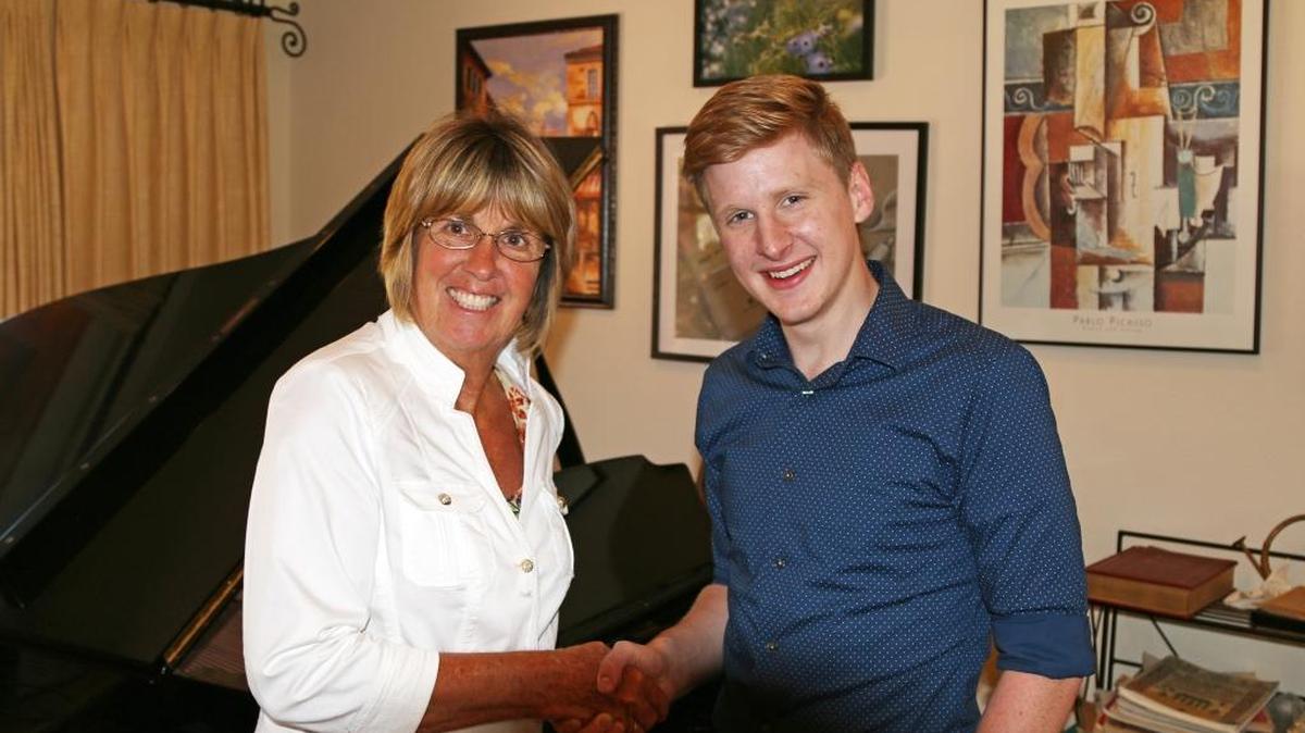 Connie Pillsbury, left, congratulates Corey Hable as recipient of the Barbara M. Jones Music Scholarship.
