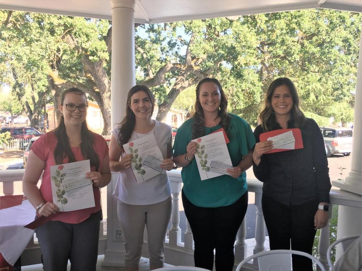 Students who received $200 scholarships from the Alpha Mu Chapter of Delta Kappa Gamma International are Katie Bratt, Heather Anderson, Melanie Thatcher and Ashley Clarkson. Not pictured are Kyndall Maring and Claire Jones.