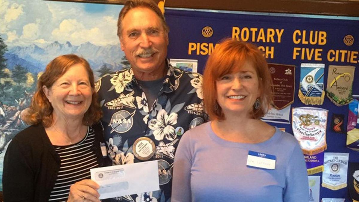 Rotary Club of Pismo Beach-Five Cities recently presented a check in the amount of $1,484 to San Luis Obispo County Womenade. Here, Sandy Richardson from Womenade, receives the check from Steve Curry of Rotary Club of Pismo Beach-Five Cities. At right is Lisa Lazzara, also from Womenade.