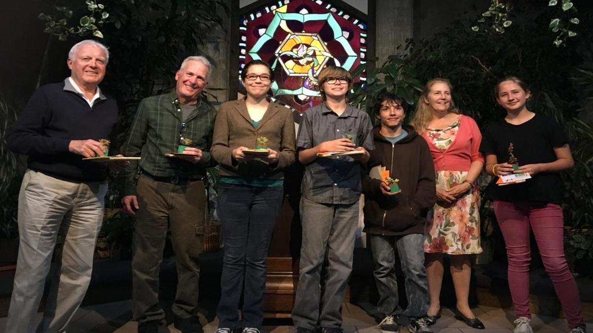Morro Bay National Estuary Program poetry contest winners and runners-up gather for a celebratory reading at Coalesce Bookstore in Morro Bay. From left are Richard Immel, Ted Schade, Fiona Reams, Luke Mellom, Dylan King, Dawn Wood and Vienna Laughlin. Lani Steele is not pictured.