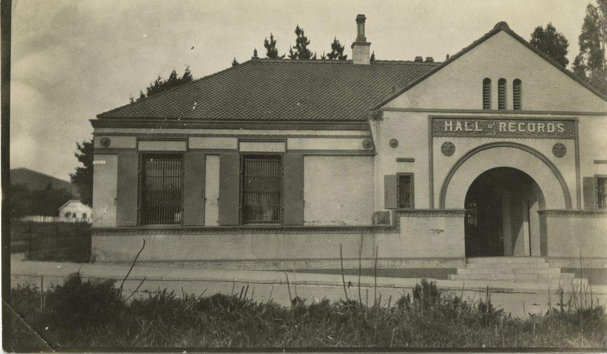 An undated photo shows the San Luis Obispo Hall of Records next to the county courthouse at Osos and Palm Streets in San Luis Obispo, after the bricks were plastered in 1911.