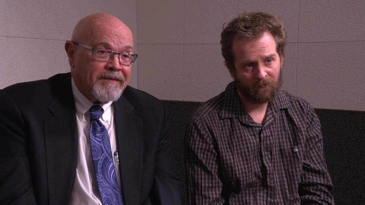 San Luis Obispo defense attorney Ilan Funke-Bilu, left, and his client, Beau Brigham, appear in a scene from CBS News’ ”48 Hours: Click for a Killer,” airing Saturday. Brigham, a Riverside resident, is accused of soliciting the murder of his stepmother, who lives in San Luis Obispo; he has pleaded not guilty.