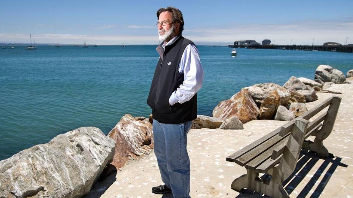 Richard Martinez, father of Christopher Michaels-Martinez, who was killed in the violent rampage near UCSB in May, looks out across the water at Port San Luis, a place he and his son loved to visit together.