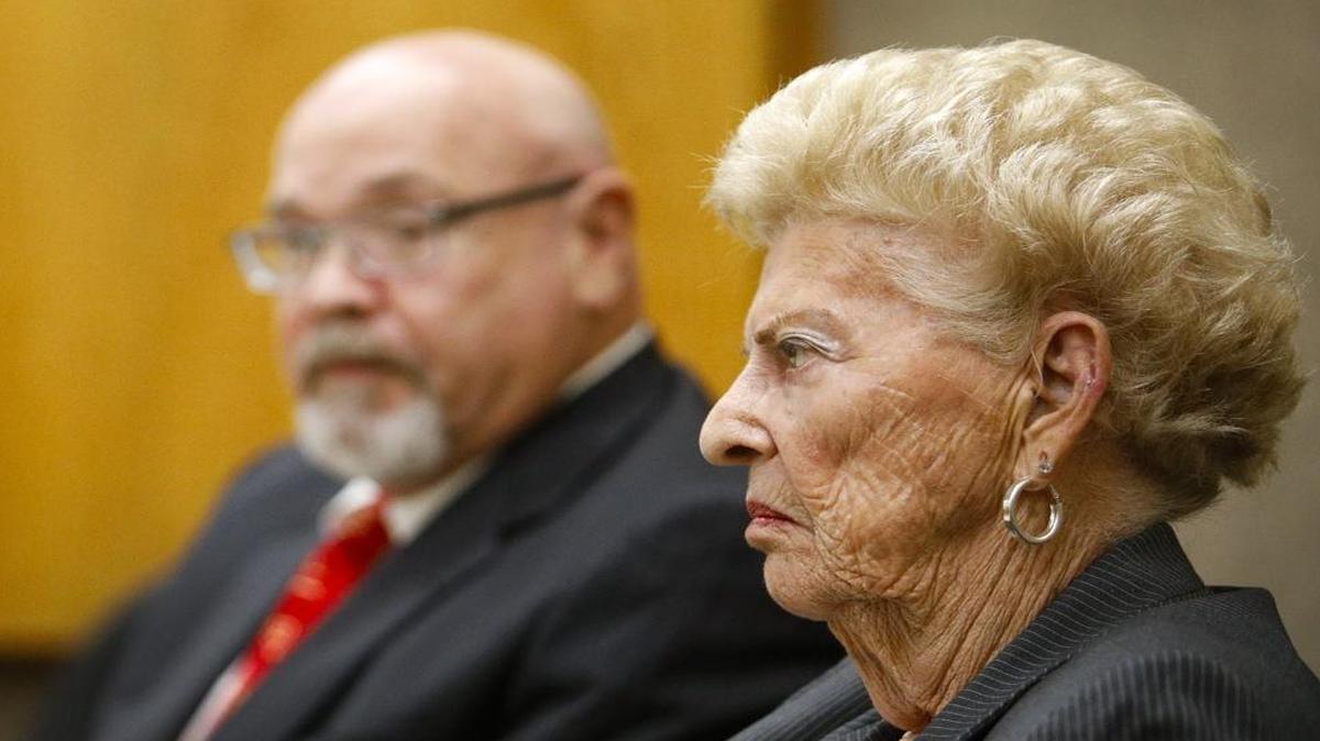 Edith “Edie” Knight of Atascadero listens with defense attorney Ilan Funke-Bilu on Wednesday during her trial for misdemeanor electioneering at a polling place.