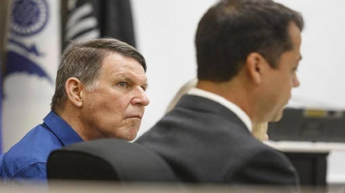 James Victor Lypps listens as defense attorney Matthew Guerrero cross-examines a witness during the first day of his trial for the alleged murder of his wife, Sherre Neal-Lypps, in 2009.