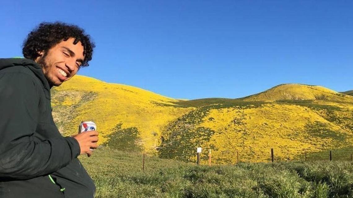 Kennedy Love, 22, who was killed in a hit-and-run in August, smiles during a visit to see the superbloom on the Carrizo Plain this past spring.
