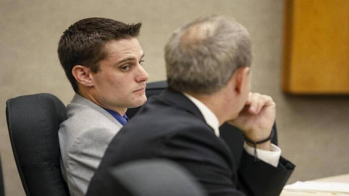Former Grover Beach police officer Alex Geiger, left, appears with his attorney John Jackson in July at the beginning of a preliminary hearing in his criminal case. Geiger, the Grover Beach Police Department, the Exeter Police Department and the owners of Geiger’s former rental are being sued by the surviving victim of a Dec. 13 dog mauling and the family of another neighbor who was killed.