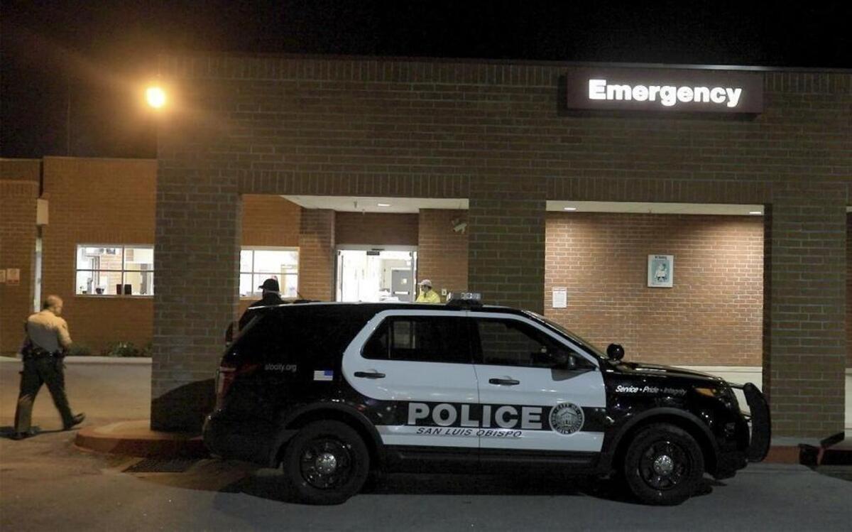 Several law enforcement agencies gather at Sierra Vista Regional Medical Center on Wednesday night after two men believed to be suspects in a Paso Robles shooting ended up there.
