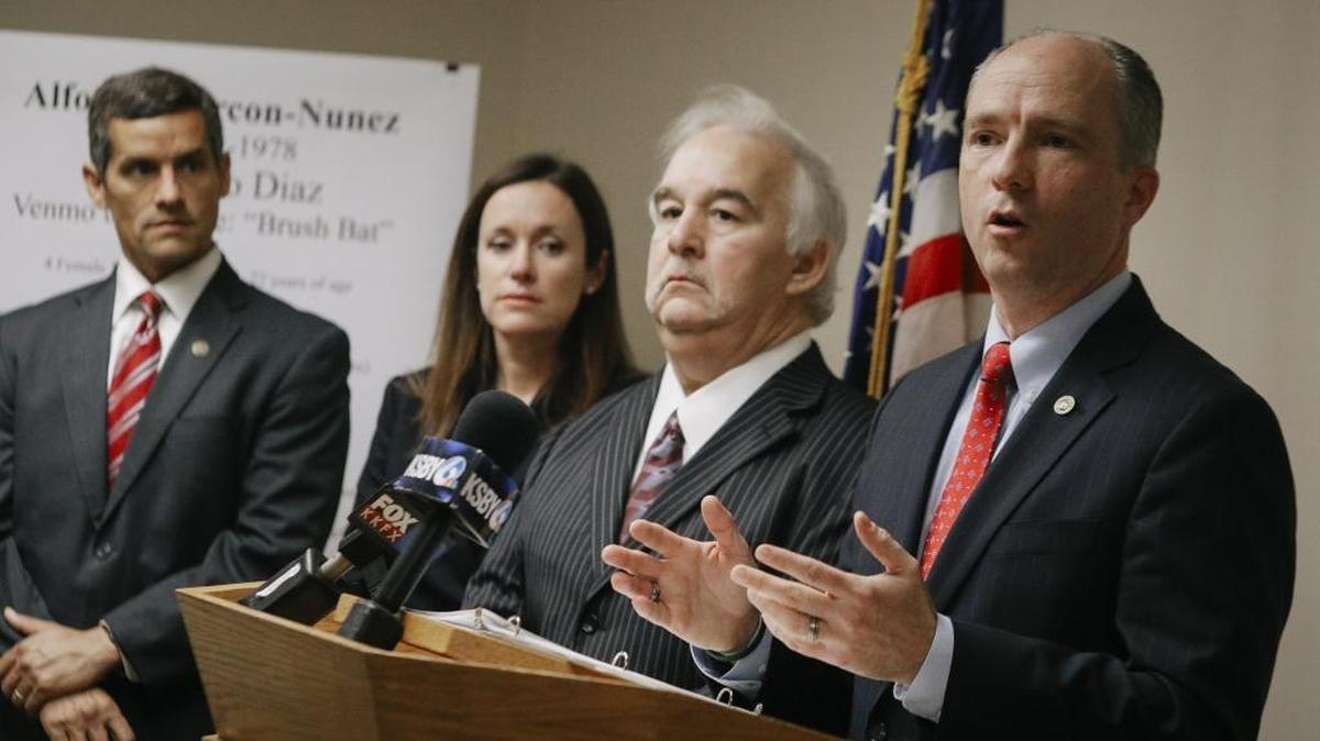 San Luis Obispo County District Attorney Dan Dow, right, holds a press conference in January to announce charges against Uber driver Alfonso Alarcon-Nunez, whose criminal case inspired Assemblyman Jordan Cunningham to submit a bill signed Thursday to strengthen background checks for drivers for ride-sharing services.