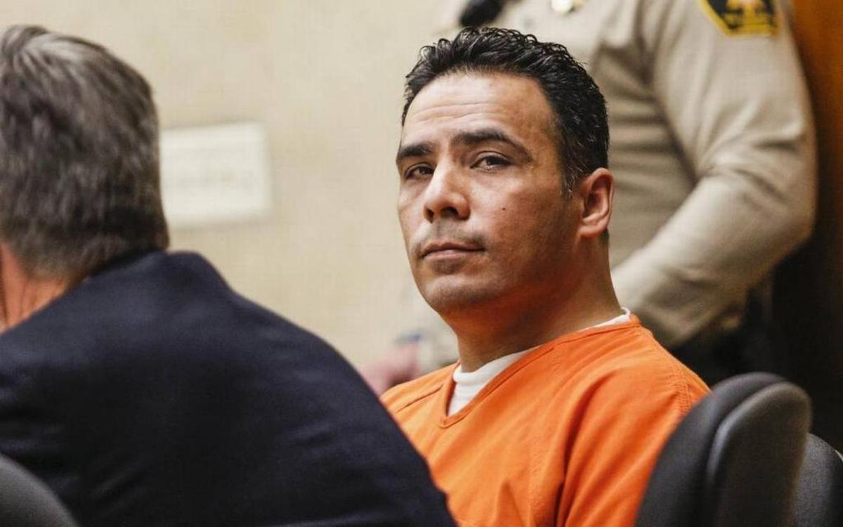 Former Cayucos volunteer firefighter Oscar Higueros, convicted of human trafficking and other sex crimes, listens during his sentencing hearing in San Luis Obispo Superior Court in 2016.