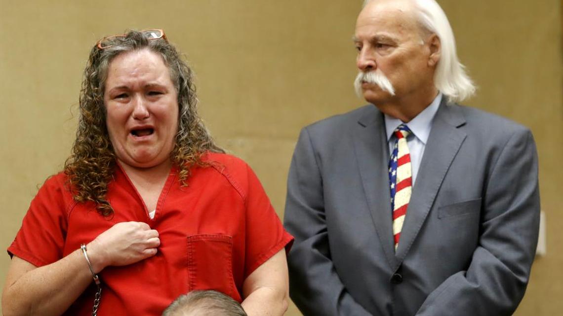 Michelle Yvonne Hart, 46, with her attorney Ron Crawford in San Luis Obispo Superior Court, tearfully apologizes Wednesday to the family of Glen Harley Fulton, who she struck and killed while driving under the influence.