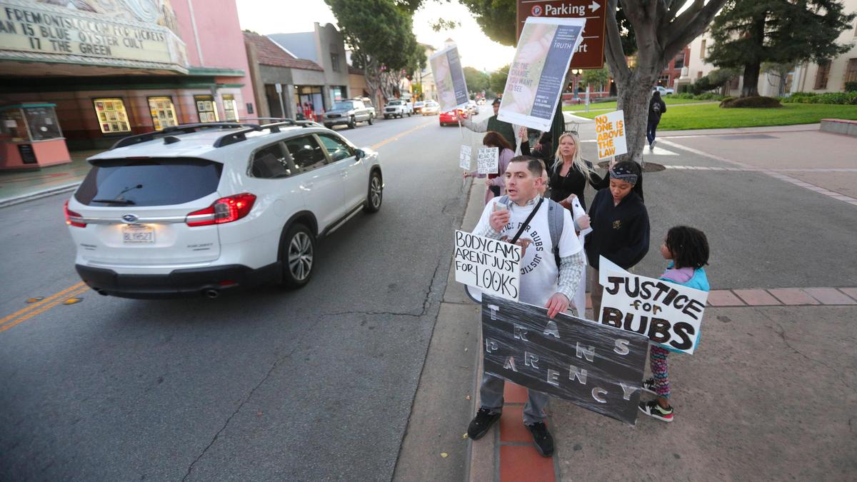 In January 2020, Nick Regalia leads chants as a group of residents gathered on Monterey Street in front of the Courthouse protesting recent actions by SLOPD including the fatal shooting of Bubbers, Nick Regalia and Riley Manafort’s dog, in September. 2019. The couple is calling on the city to release officer body camera footage of the incident.