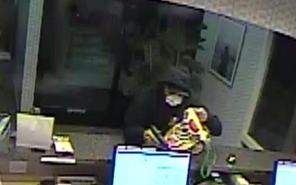 A still image taken from a surveillance camera during an armed robbery at the Spyglass Inn in Pismo Beach.