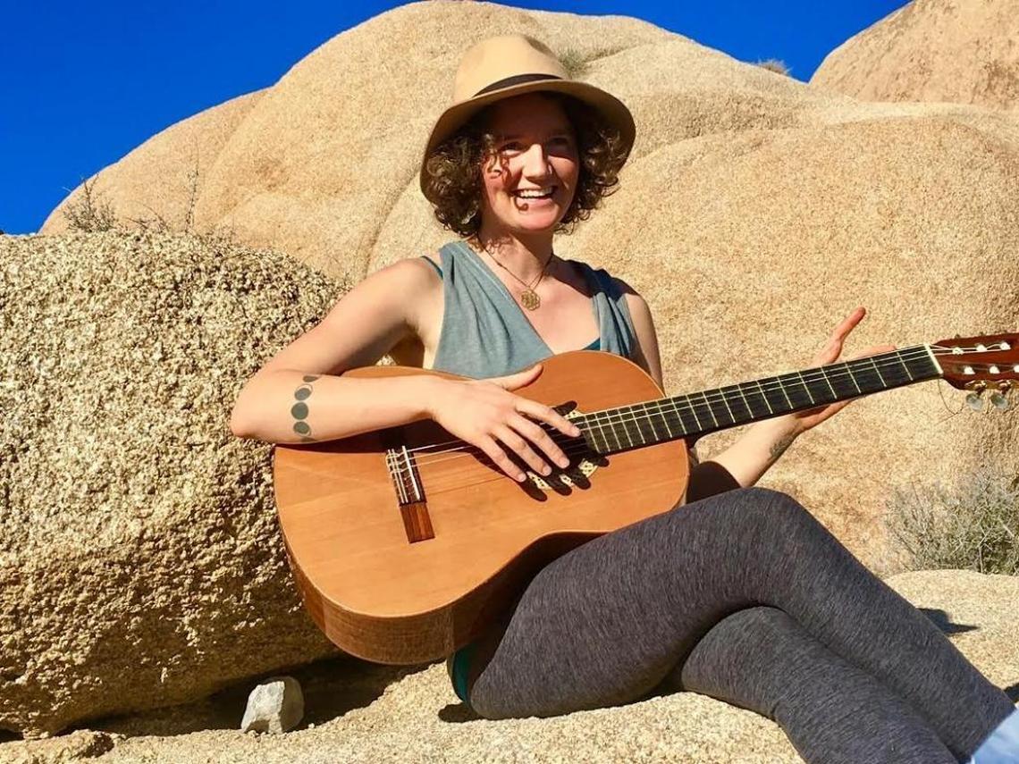 Emilie Inman poses for a picture while on a camping trip to Joshua Tree in 2016.