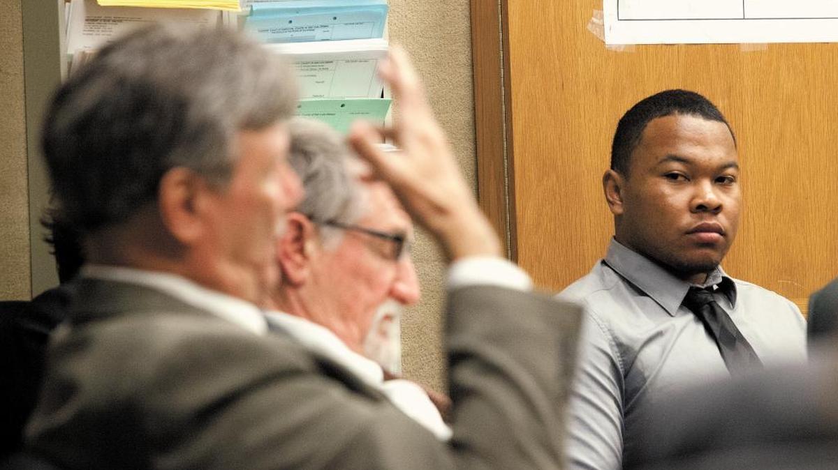 Kristaan Ivory watches defense attorney Chris Casciola talk to Judge Donald G. Umhofer during a hearing in January 2015. Defense attorney for Jacob Brito, Denton Wilson, is seated between them.