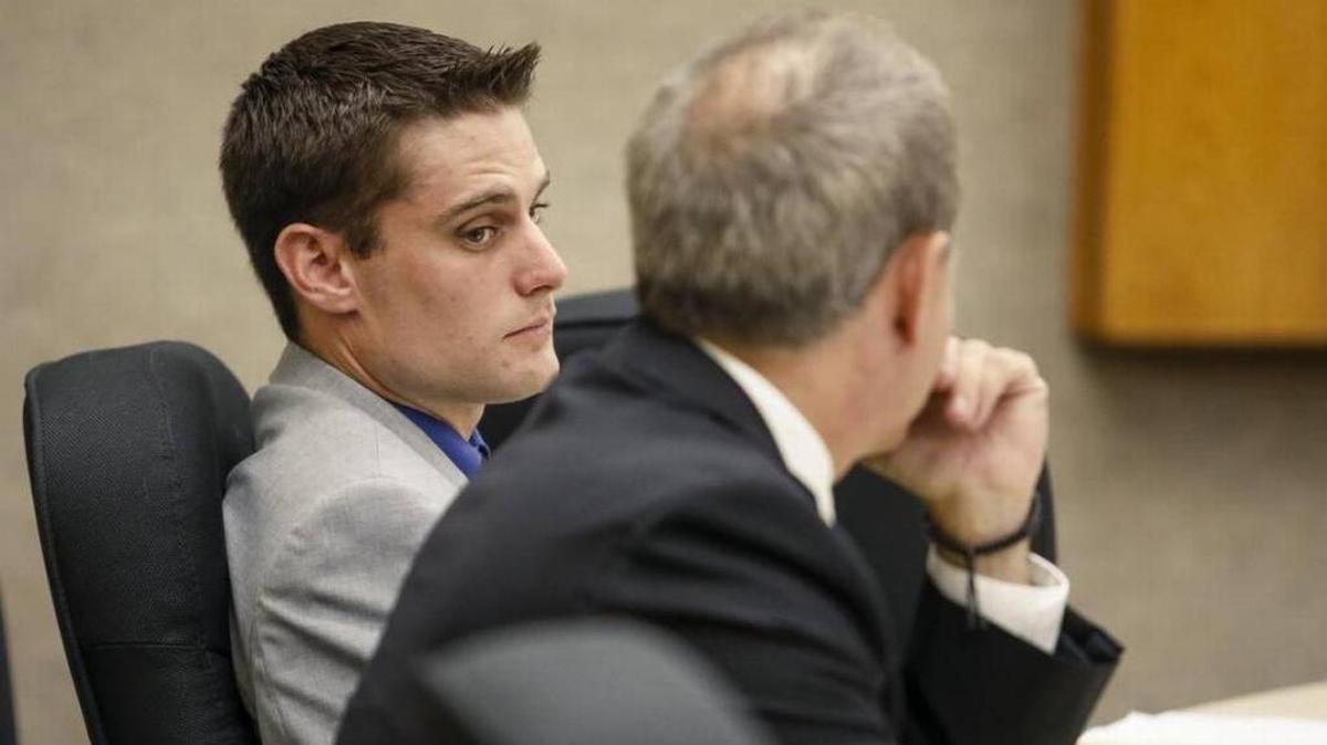Former Grover Beach police officer Alex Geiger, left, sits with his previous lawyer during a July 2017 preliminary hearing in San Luis Obispo Superior Court.