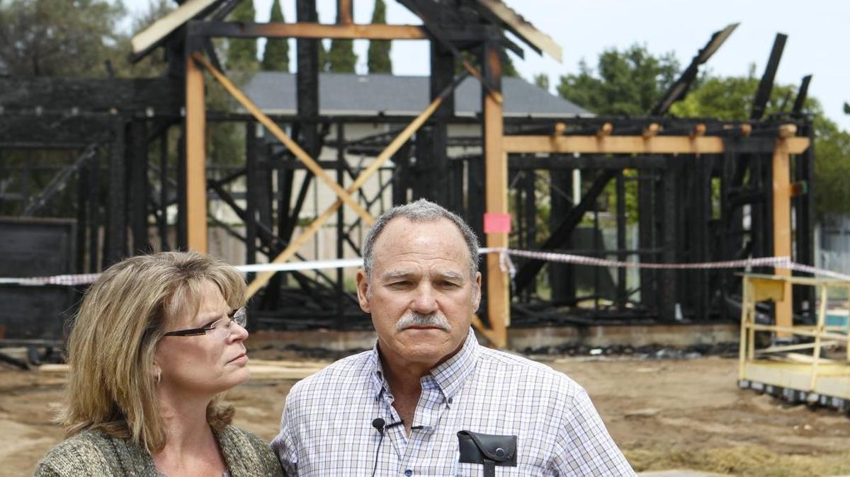 Donna and Greg France, farmers and project owners at the scene of Nipomo housing under construction intended for farm workers. One house was struck by an arsonist, destroying one unit and damaging another.