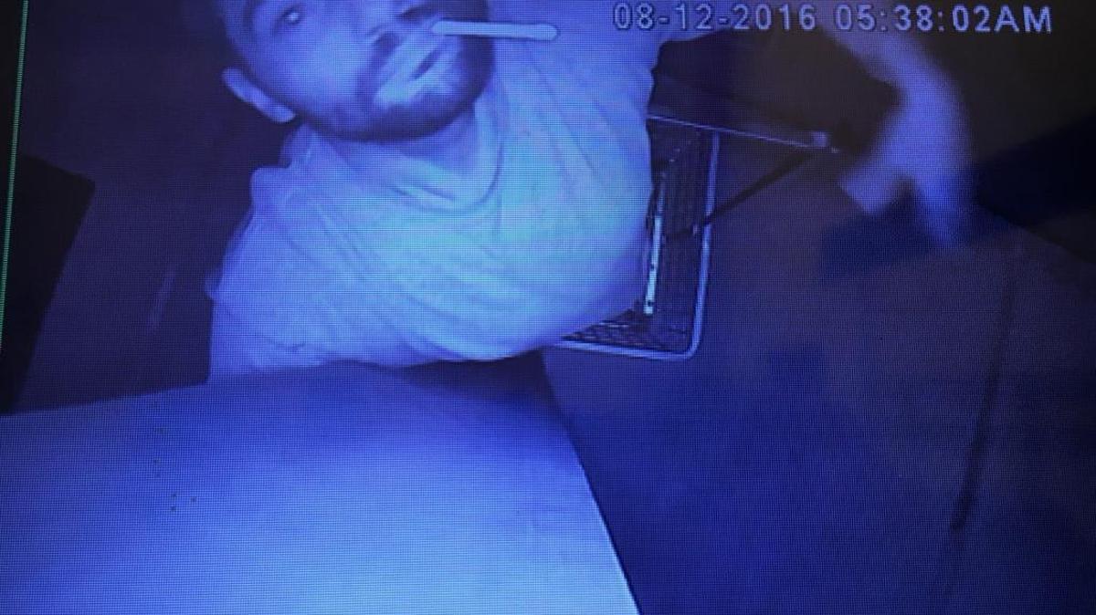 A still image from a surveillance camera shows a man stealing the camera outside Tacos De Acapulco in Grover Beach. The camera recorded him committing the theft.