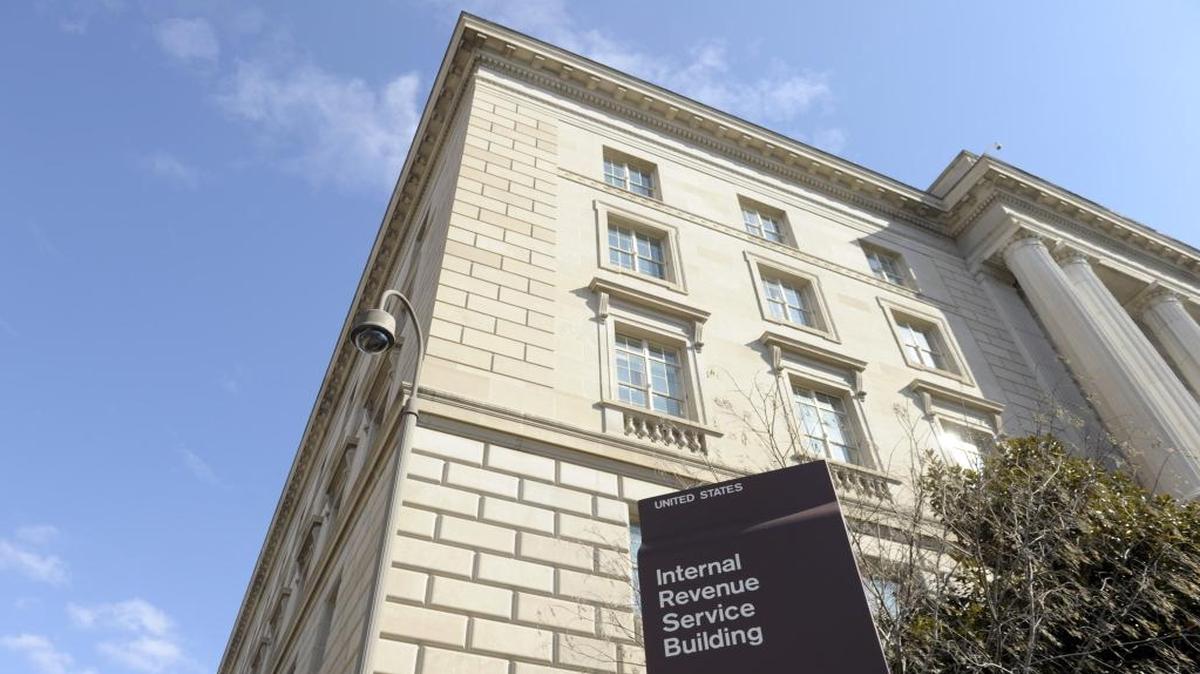 This March 22, 2013 photo, shows exterior of the Internal Revenue Service building in Washington. Fake IRS agents have targeted people with harassing phone calls demanding payments and threatening jail as part of a huge nationwide tax scam. More than 3,000 people fell for the ruse between 2013 and 2015.