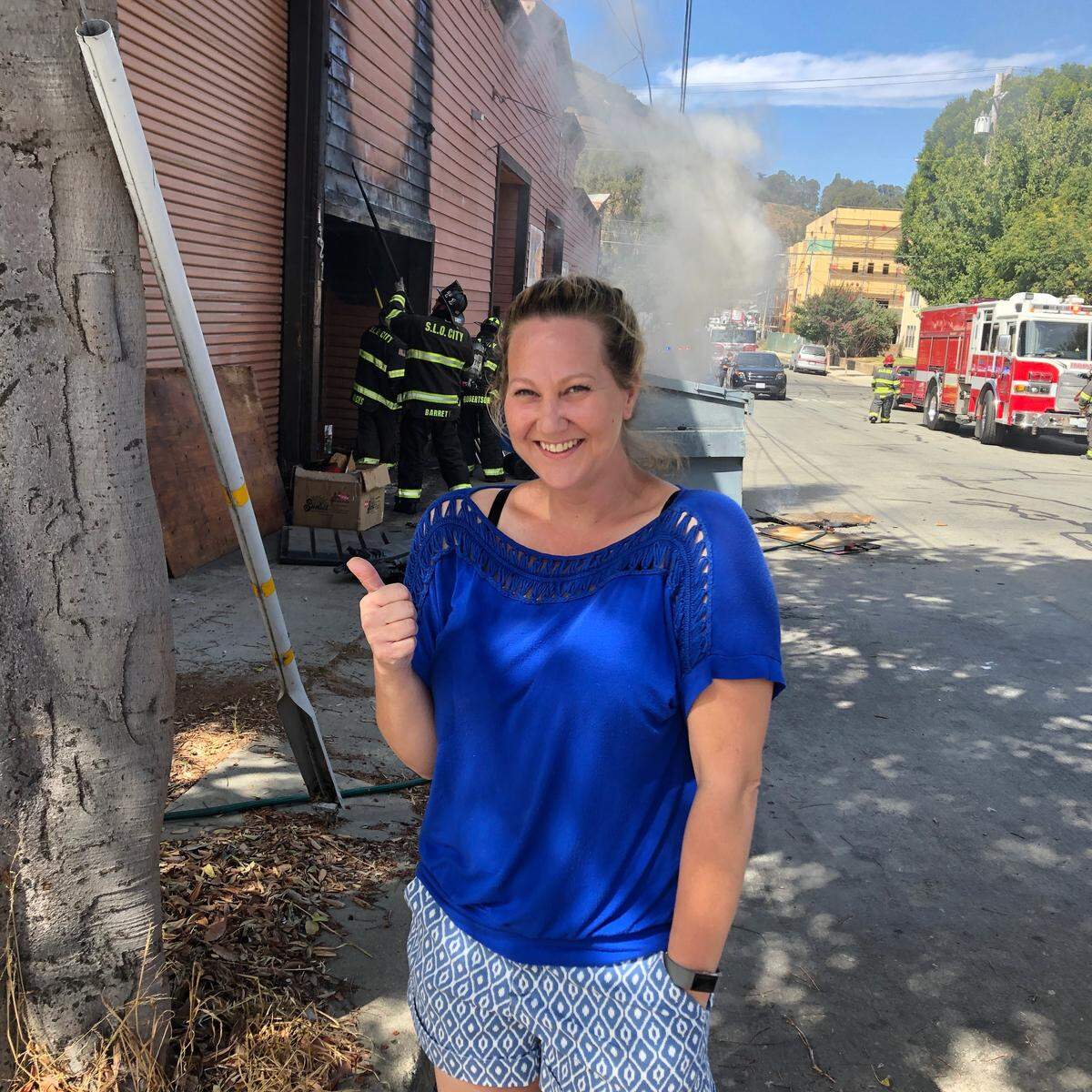 Erin McClellan-Momburg, a neighbor, responded to the fire by spraying it with a fire extinguisher.